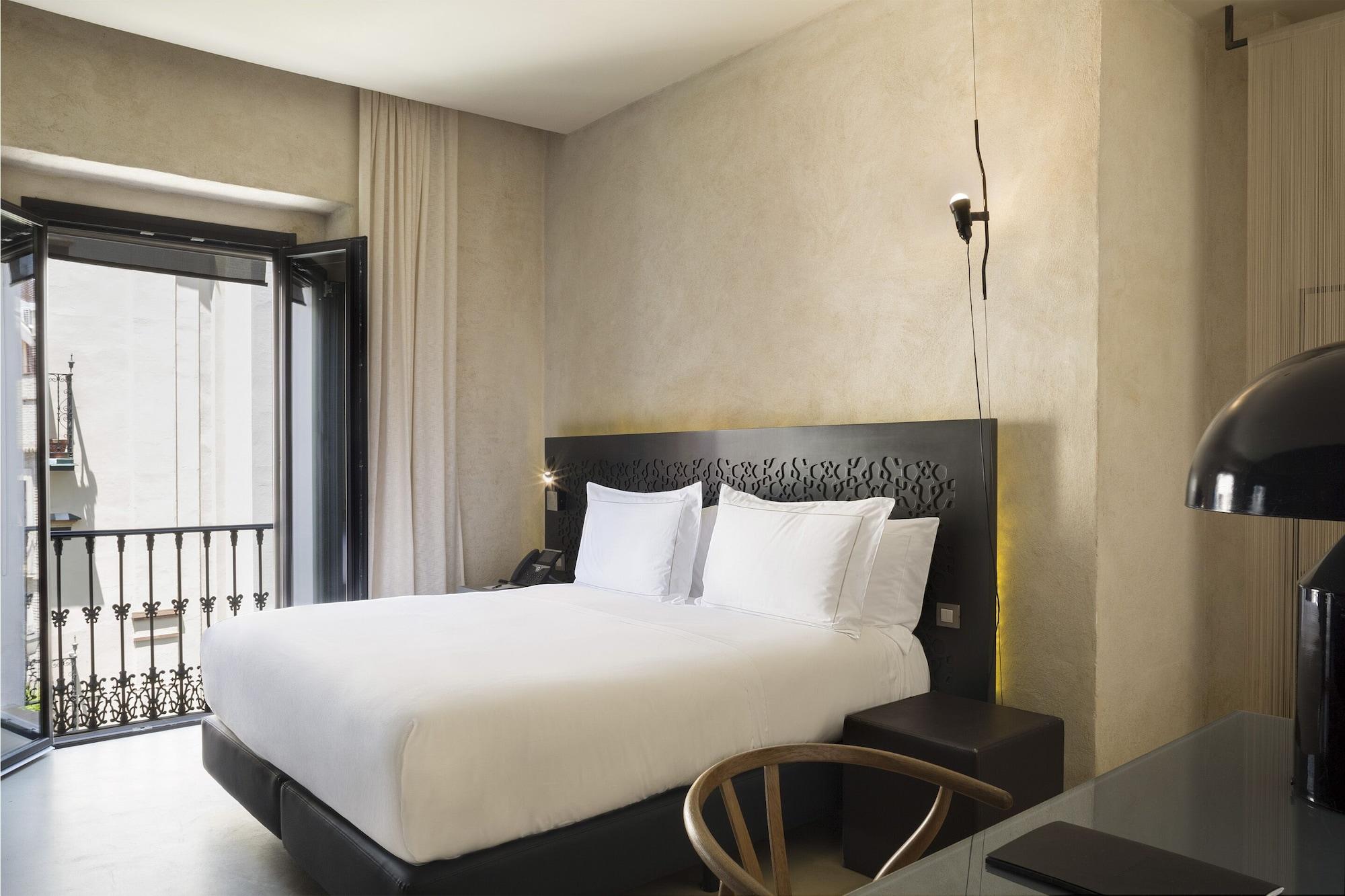 默瑟尔eme教堂酒店 塞维利亚 外观 照片 A room at the hotel