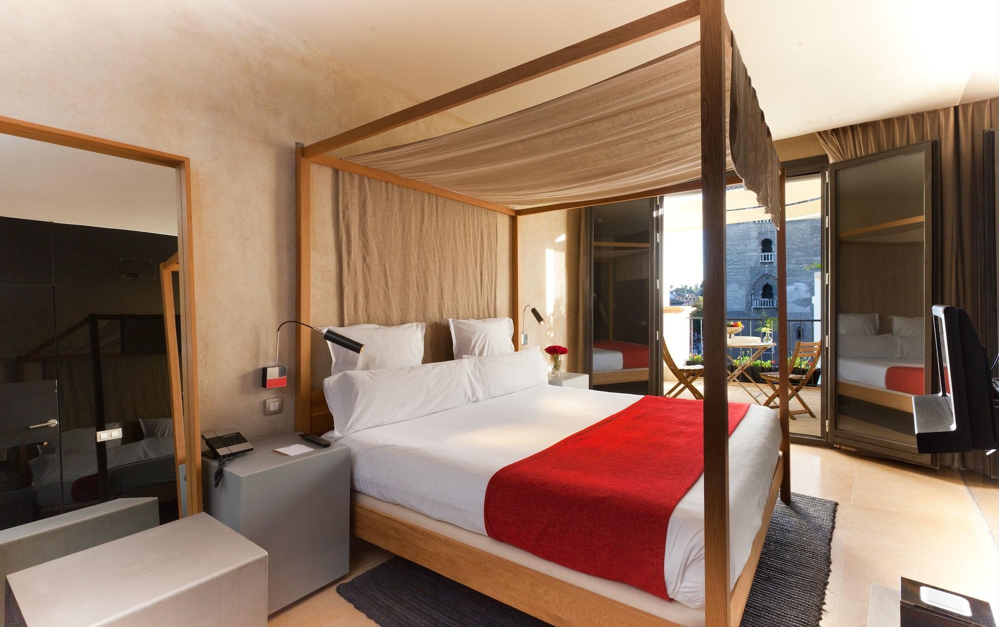 默瑟尔eme教堂酒店 塞维利亚 外观 照片 A bedroom at the hotel