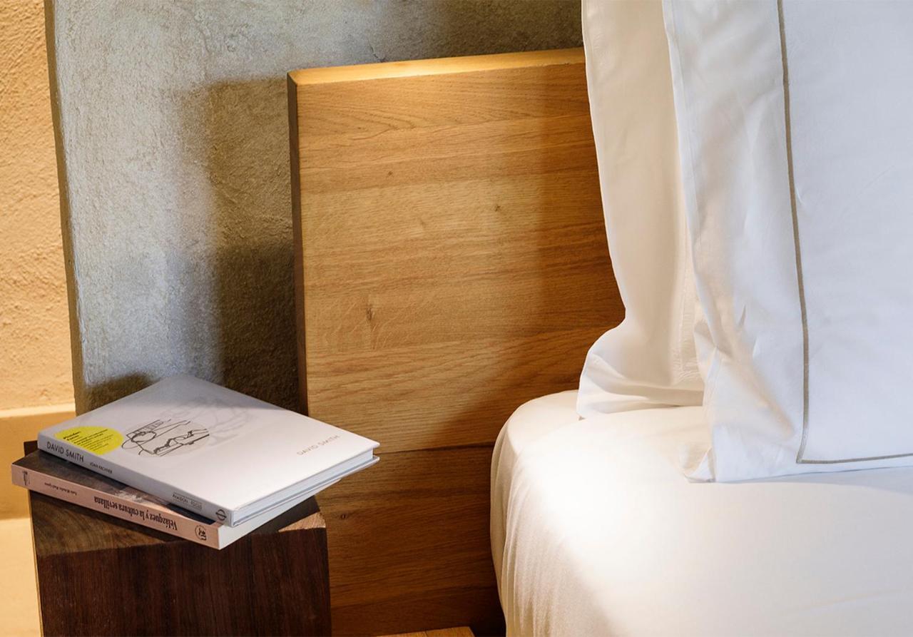 默瑟尔eme教堂酒店 塞维利亚 外观 照片 A bed with a duvet